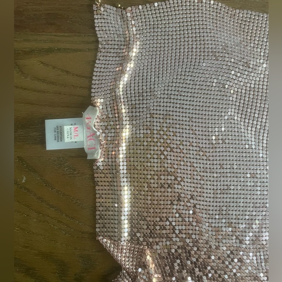 Rhinestone Backless Halter
Chain Crop Top - Picture 4 of 4